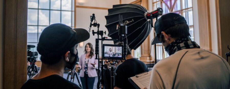 Behind-the-scenes at a Dallas video production company's set, showcasing the process of creating marketing videos with a focus on storytelling through video for effective video content marketing.