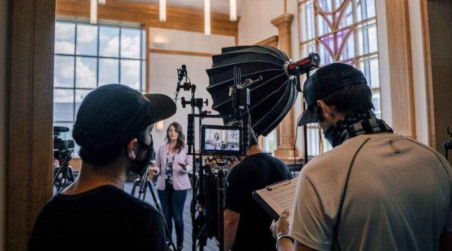 Behind-the-scenes at a Dallas video production company's set, showcasing the process of creating marketing videos with a focus on storytelling through video for effective video content marketing.